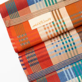 Foekje Fleur Odds & Ends Wild Weave tea towel #128B made from recycled cotton with colorful woven stripes in warm earthy tones.