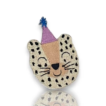 Smiling leopard face with party hat embroidered iron on patch